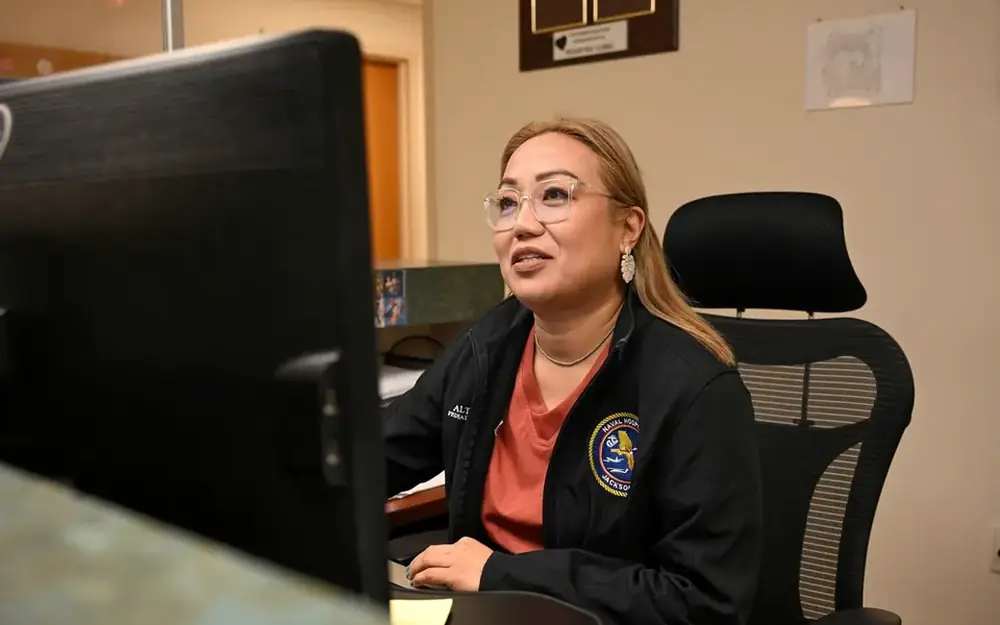 Administrative professional working at a federal facility